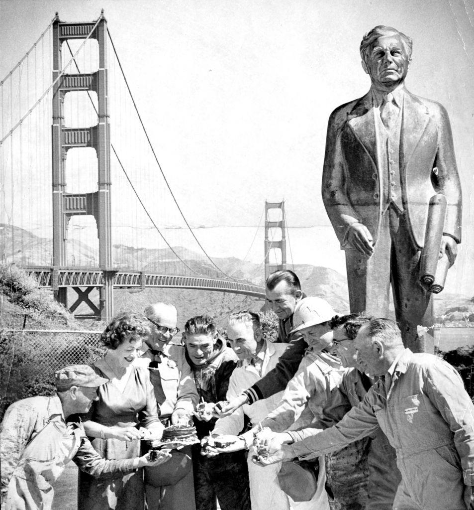 Golden Gate Bridge employees since before construction enjoy some birthday cake. May 25, 1961.