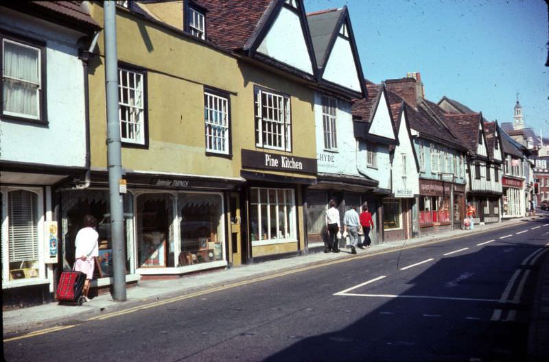 The west side of St Nicholas St looking north from Franciscan Way (left) to Friars St. with the top of the Town Hall in right background