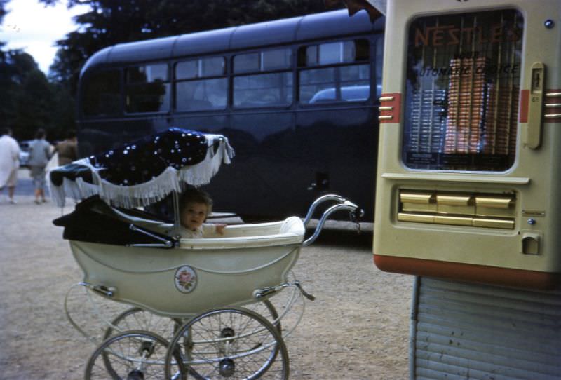 Pram and Nestle chocolate vending machine.