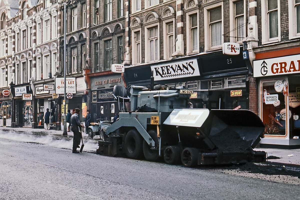 Road paving in Crouch End Broadway, north London on 15th February 1976.