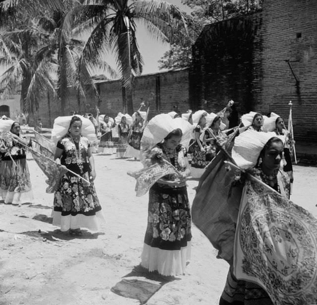 Local women wear native dresses in Tehuantepec.