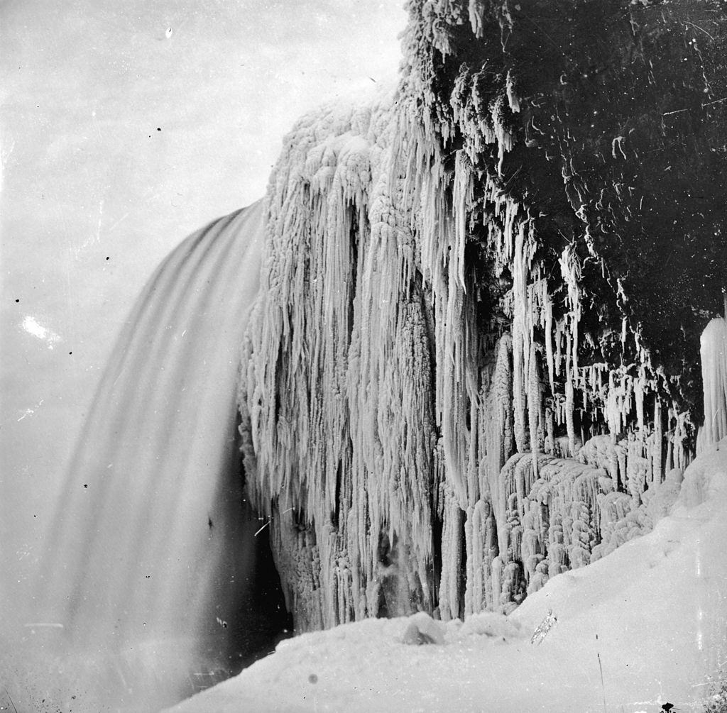 Icicles hanging from the rock at Bridal Veil or Luna Falls, on the American cataract of Niagara Falls, 1859.