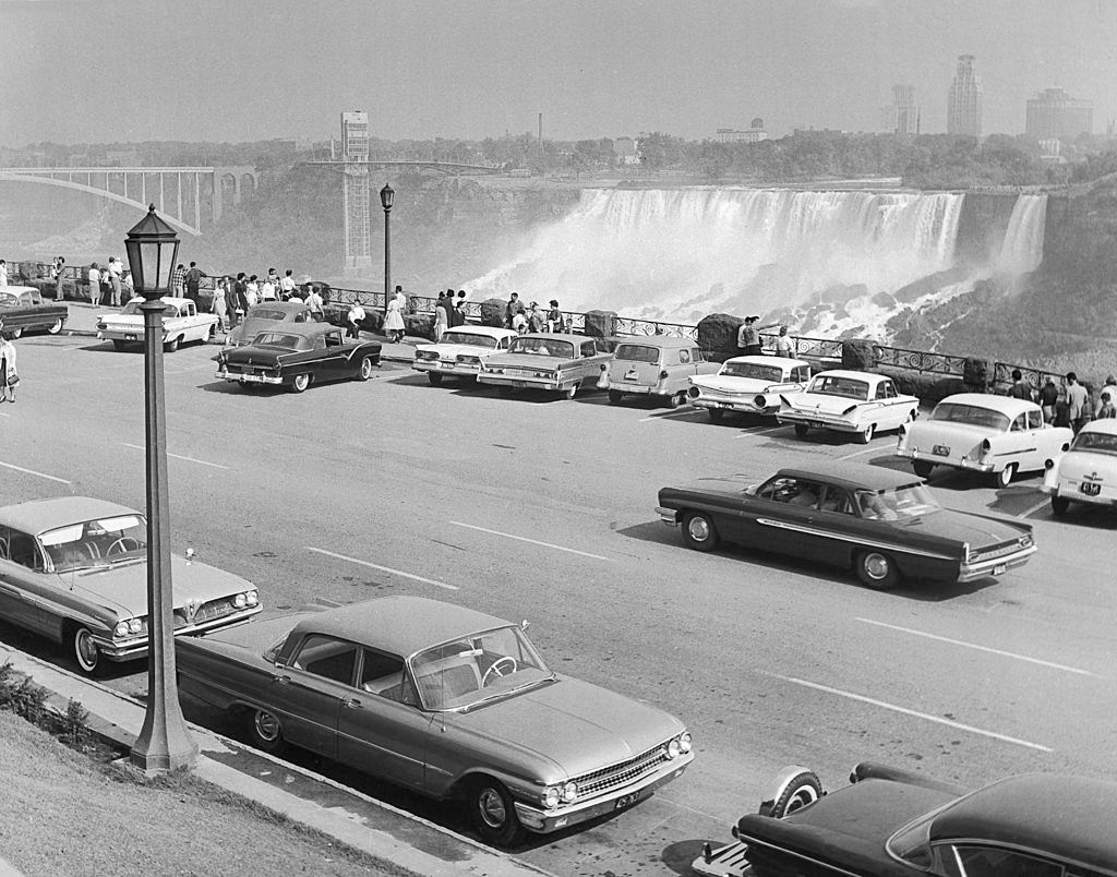 Niagara falls from the Canadian side with the Rainbow Bridge on the left and Bufallo in the Background, 1950.