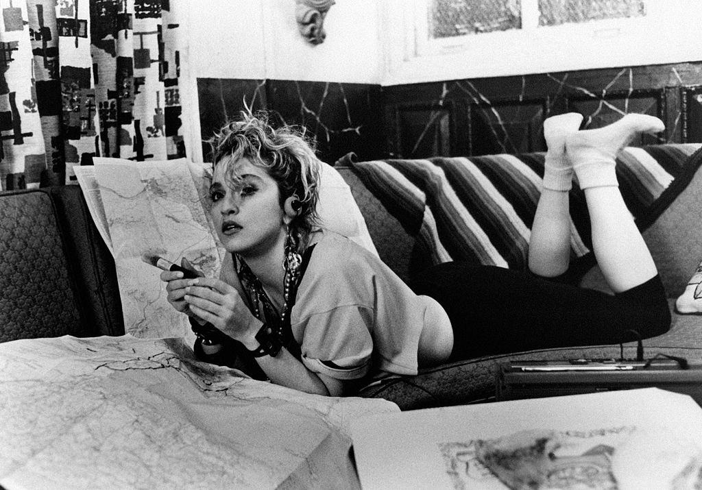 Madonna lying on a sofa, 1985.