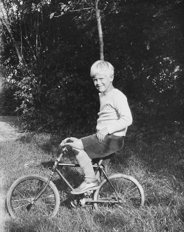 Philip riding a bicycle, 1929.