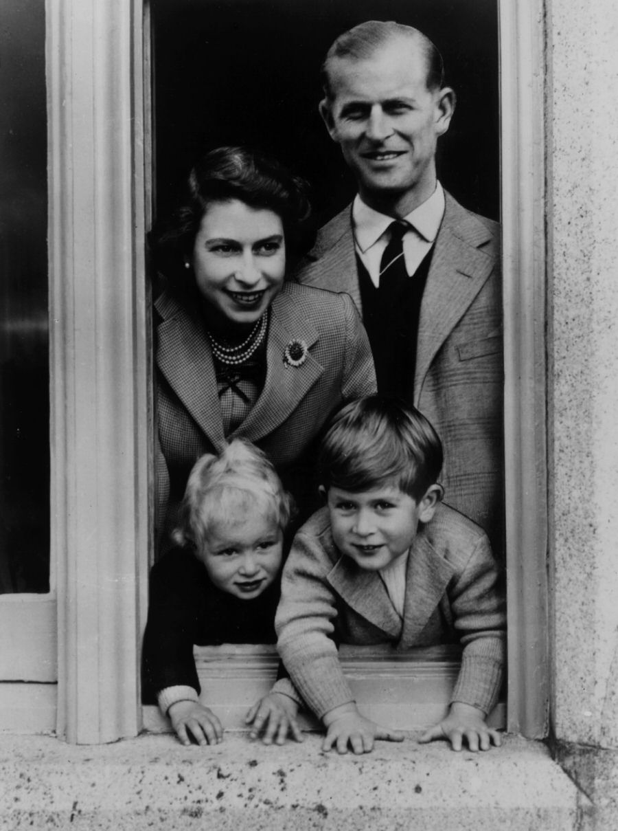 Prince Philip with Princess Elizabeth and their kids at Balmoral Castle, 1952.