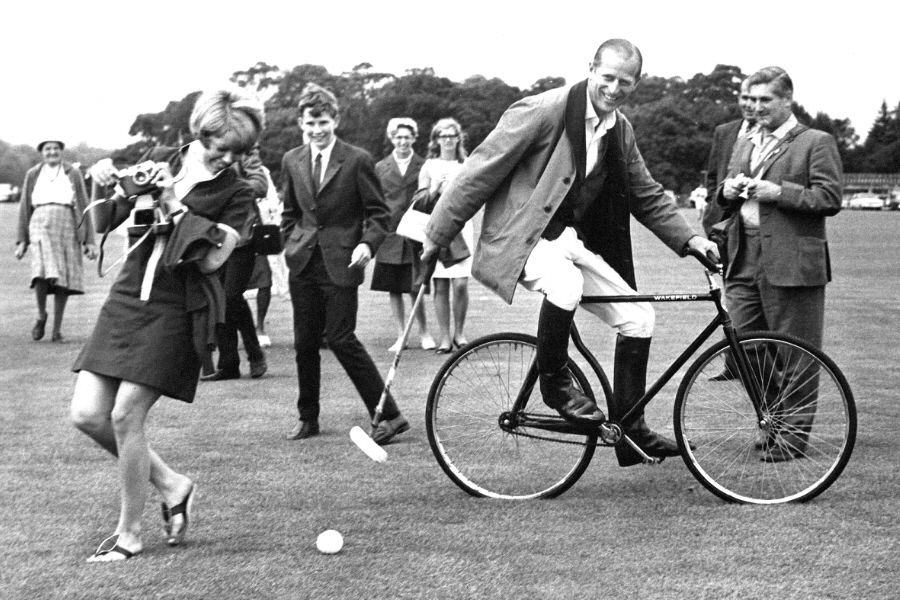 Philip playing bicycle polo, 1964.