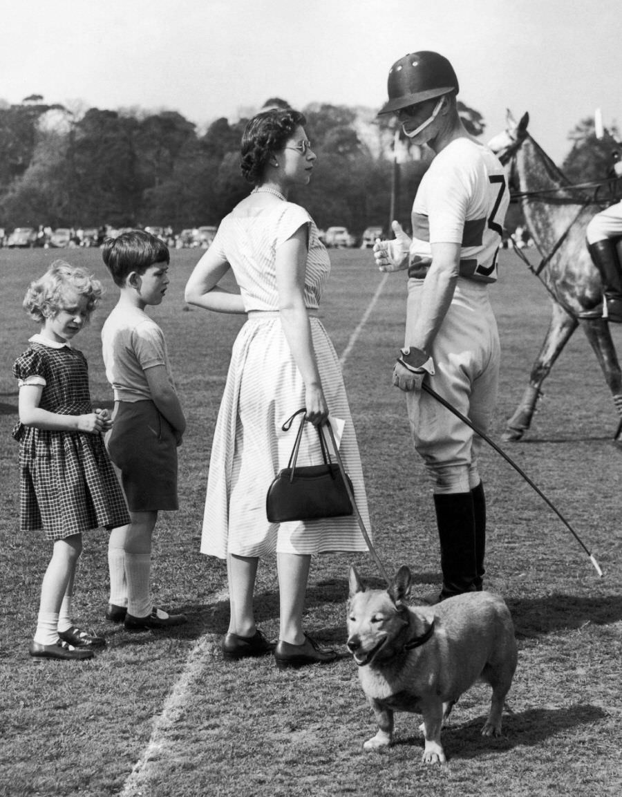 Prince Philip with Queen during a polo game in Windsor Park, 1957.