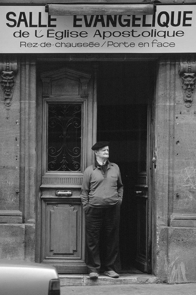 Man in front of the house