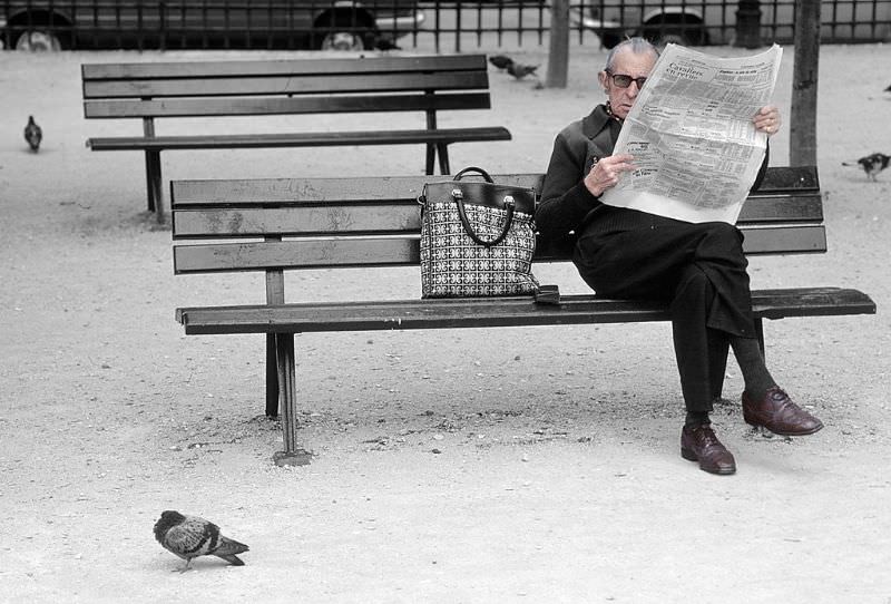 Man reading newspaper