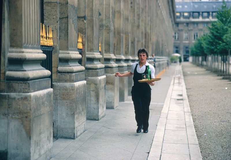 Waiter-workers training for the Champs Elysees race