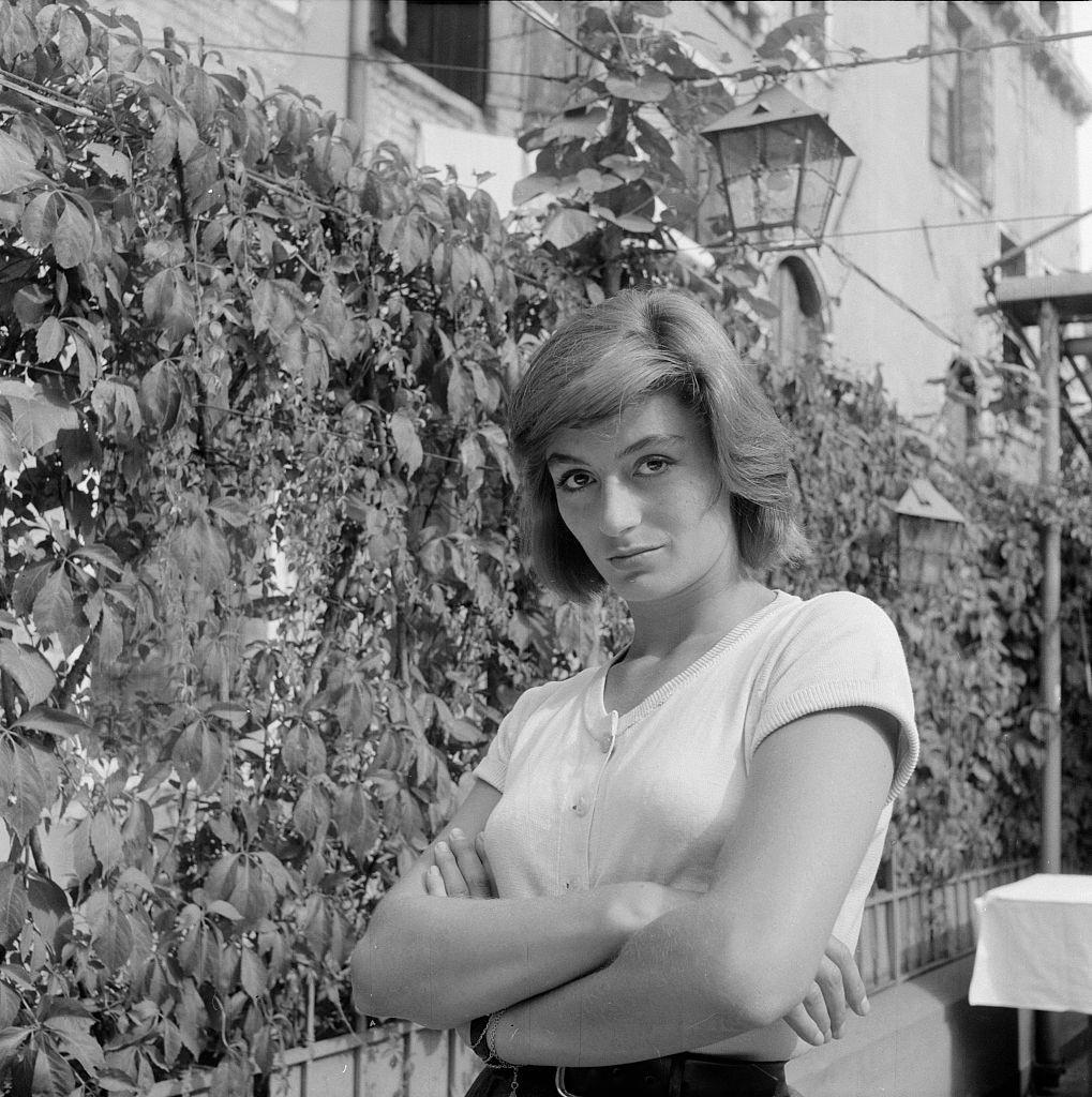 Anouk Aimée posing with crossed arms, 1950.