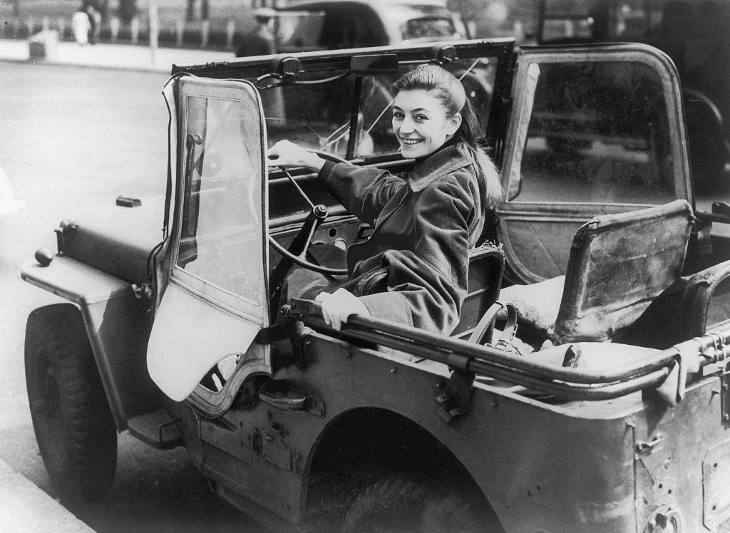 Anouk Aimée in the Jeep, 1980s.