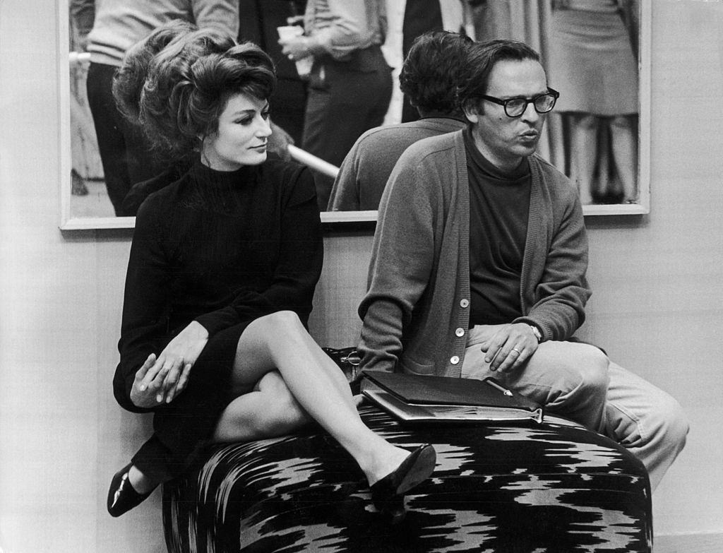 Anouk Aime sitting with the American Director Sydney Lumet, 1960.