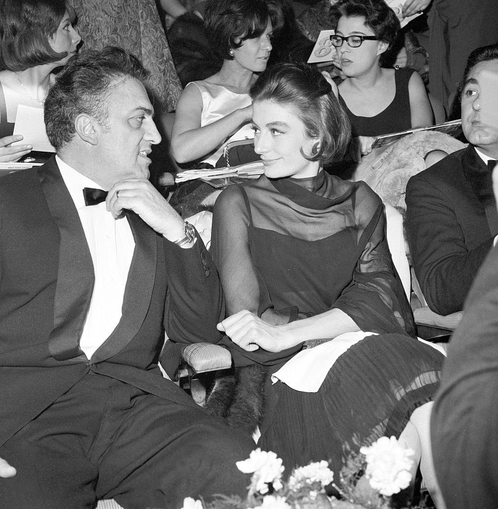 Anouk Aimée with director Federico Fellini, 1963.