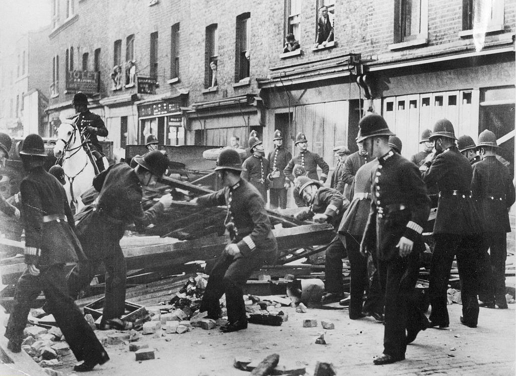 Police removing the barricades on October 4, 1936.