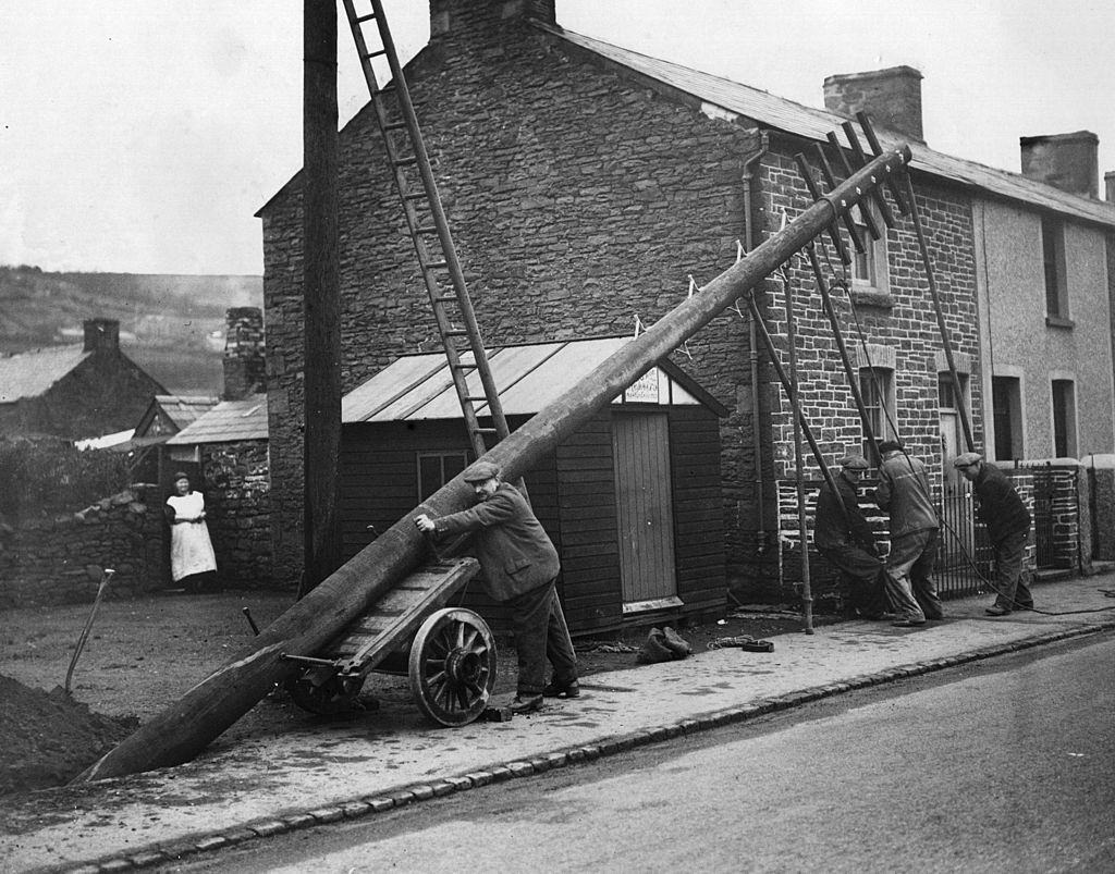 Post Office engineers erecting telegraph poles on the Cardiff Pontypridd road, 1936.