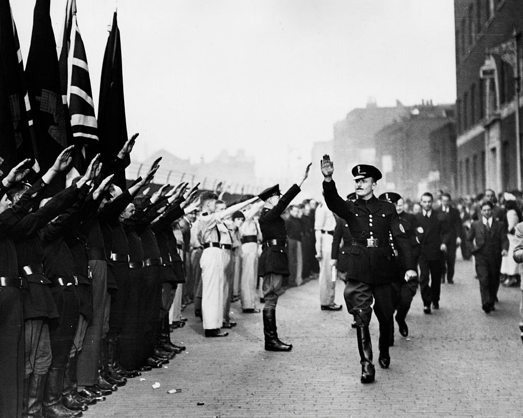 British politician Sir Oswald Ernald Mosley inspects members of his British Union of Fascists in Royal Mint Street, 4th October 1936