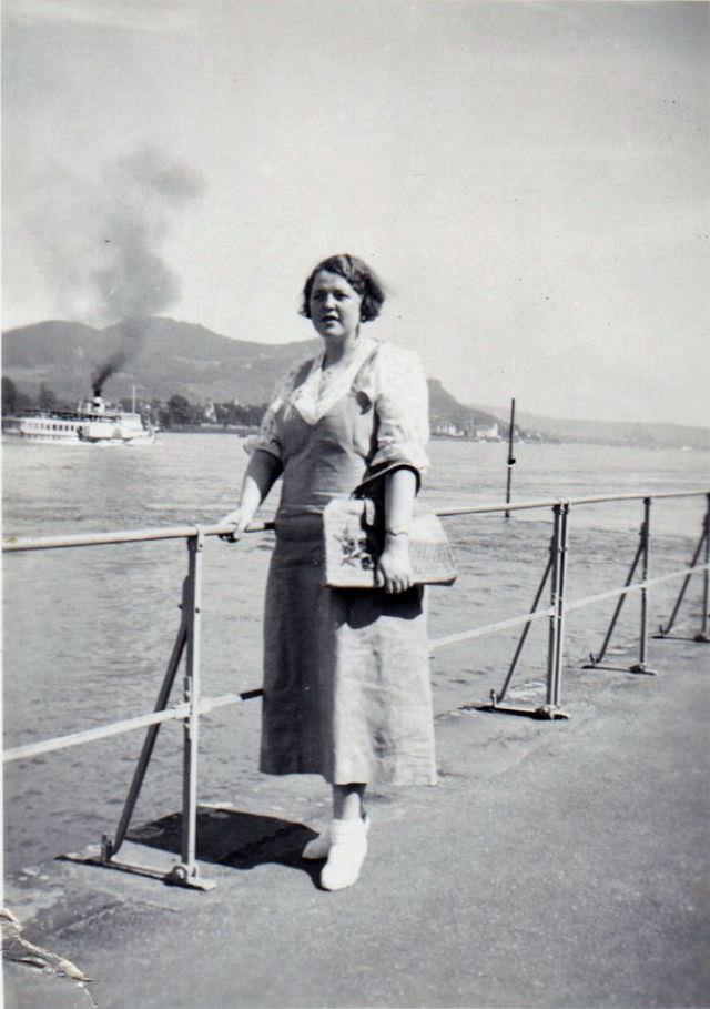 A fashionable lady posing on Bonn's Rhine Promenade on a sunny summer's day, 1935