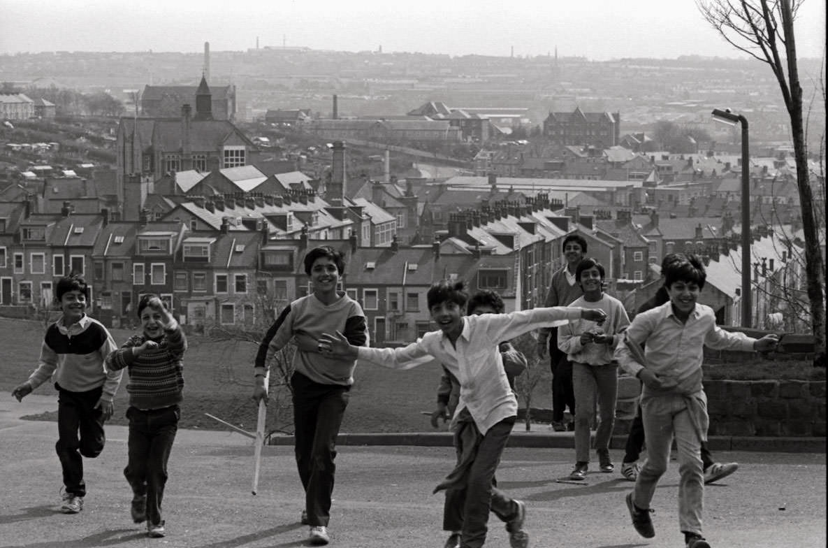 Boy playing cricket in Bradford, 1987
