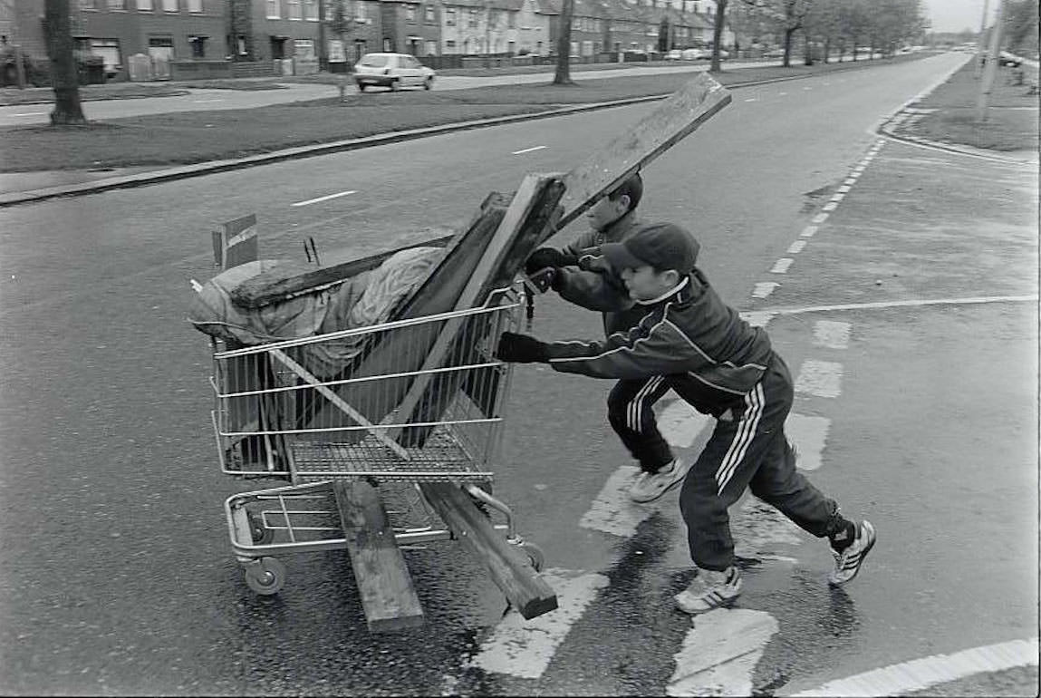 Boys collecting bonfire wood in Liverpool