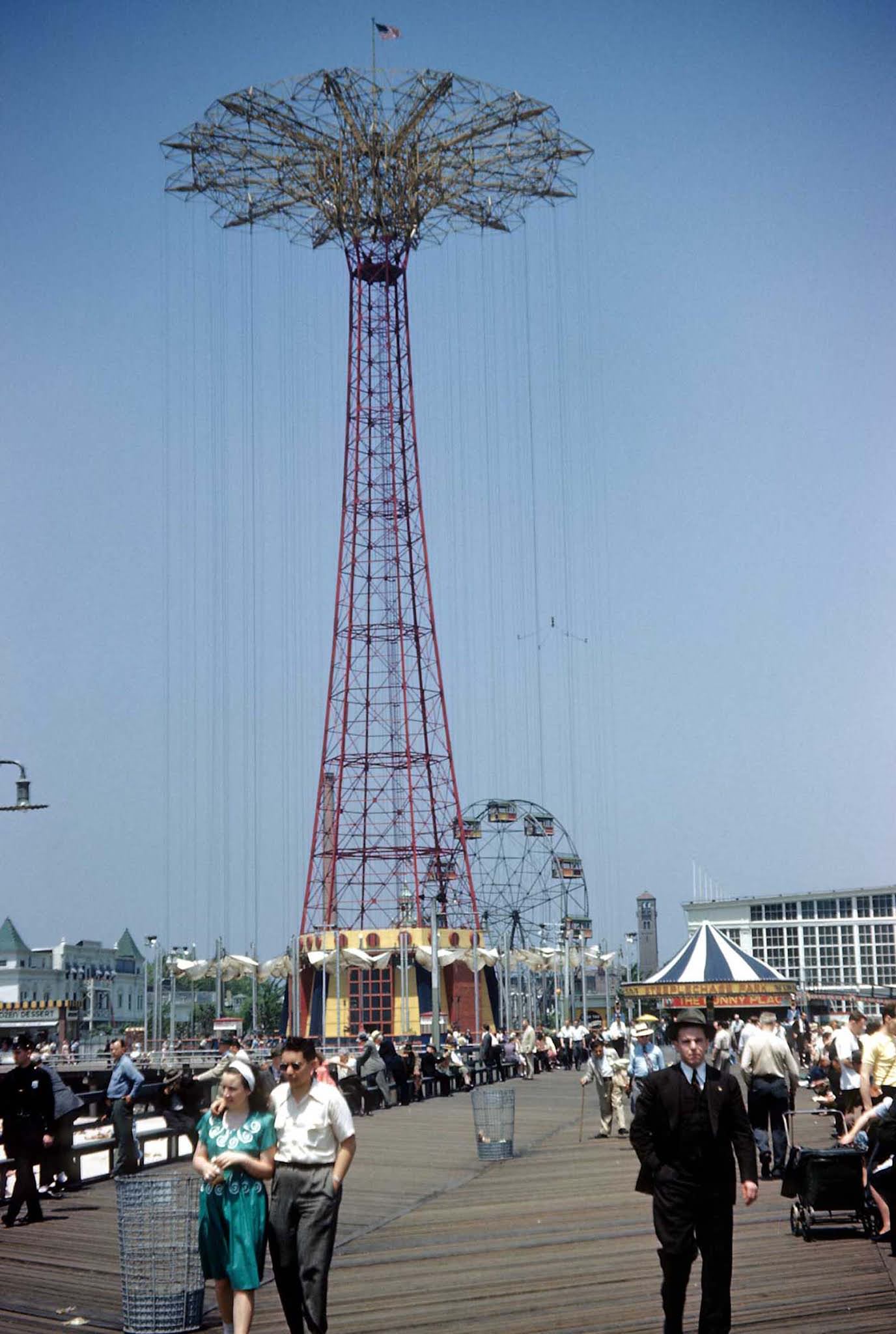 The Coney Island boardwalk and the famous Parachute Jump in Steeplechase Park, built as part of the 1939 New York World’s Fair and moved in 1941.