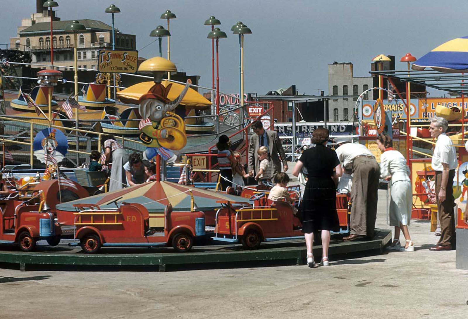 The Spinning saucer and other rides at Coney Island.