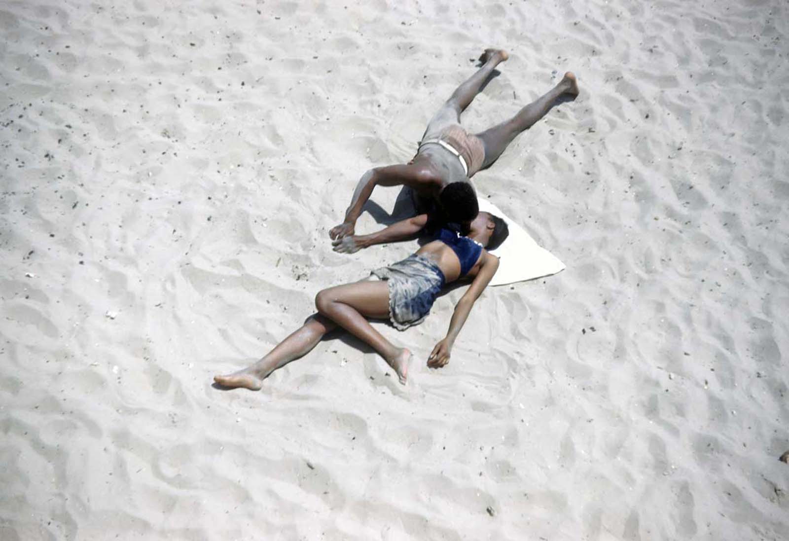 An African American couple on Coney Island beach.