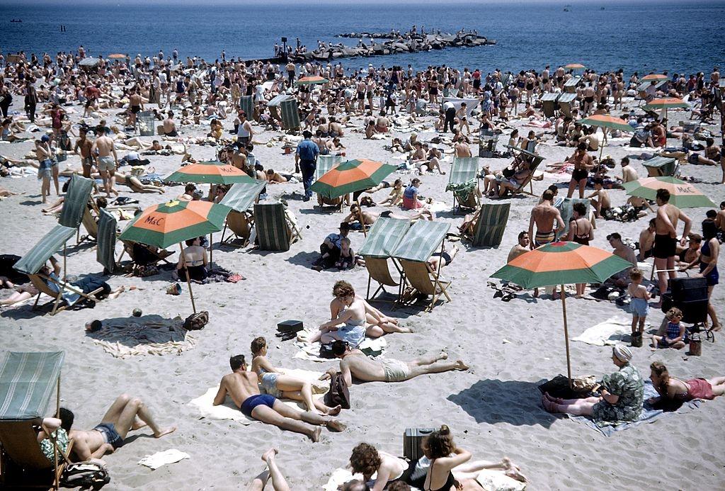 Sunbathers on Coney Island beach circa 1948 in Brooklyn
