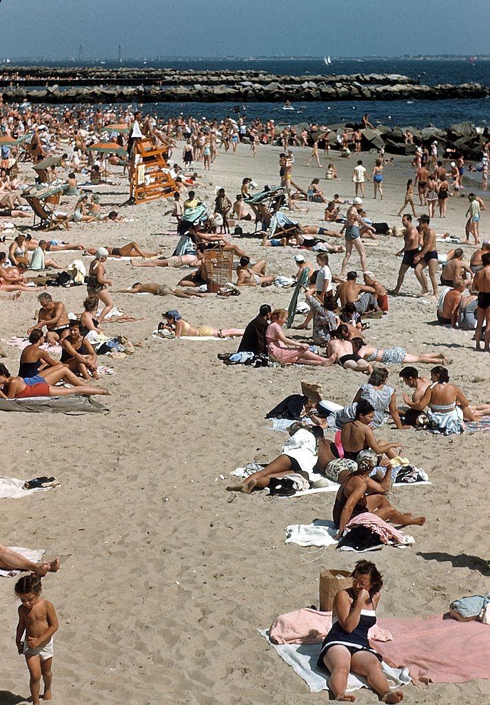 Sunbathers on Coney Island beach circa 1948 in Brooklyn.