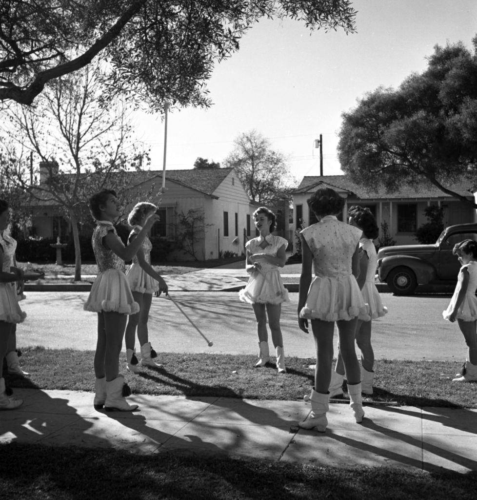 Debbie Reynolds with the Burbank Majorettes at John Burroughs High School, 1948.