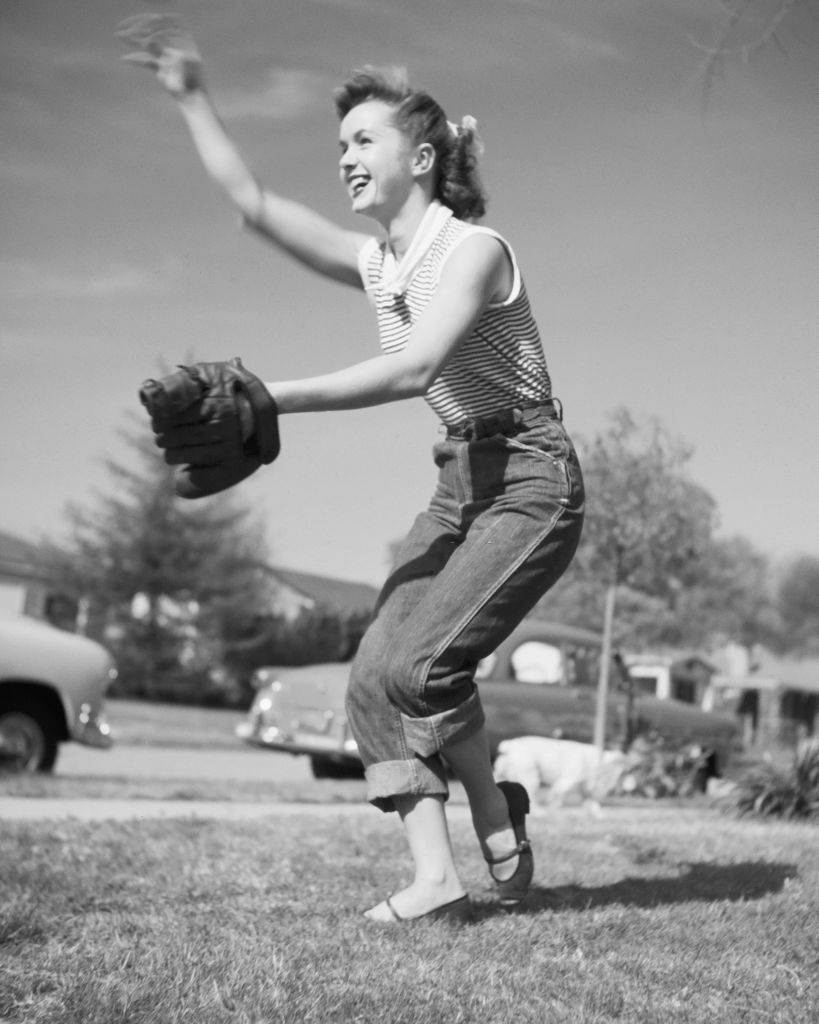 Debbie Reynolds playing baseball, 1951.
