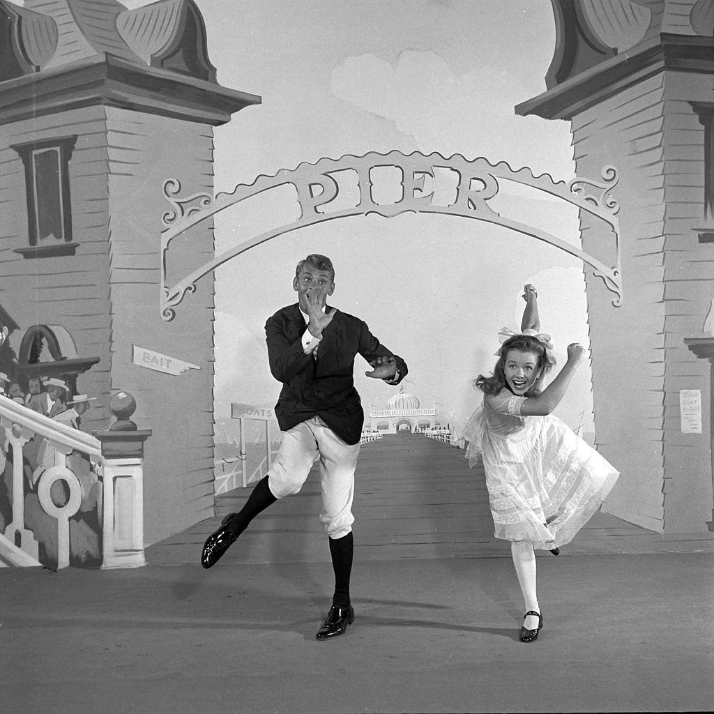 Debbie Reynolds dances with Carleton Carpenter from the film 'Two Weeks with Love', 1950.