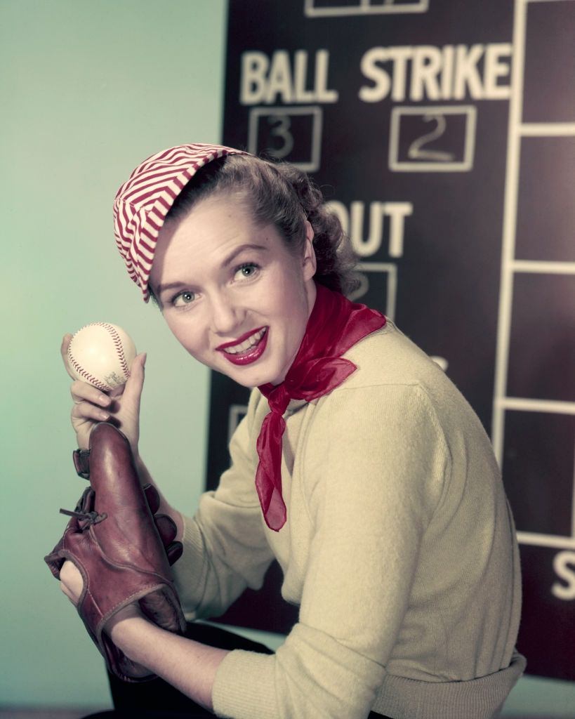 Debbie Reynolds playing baseball, 1955.