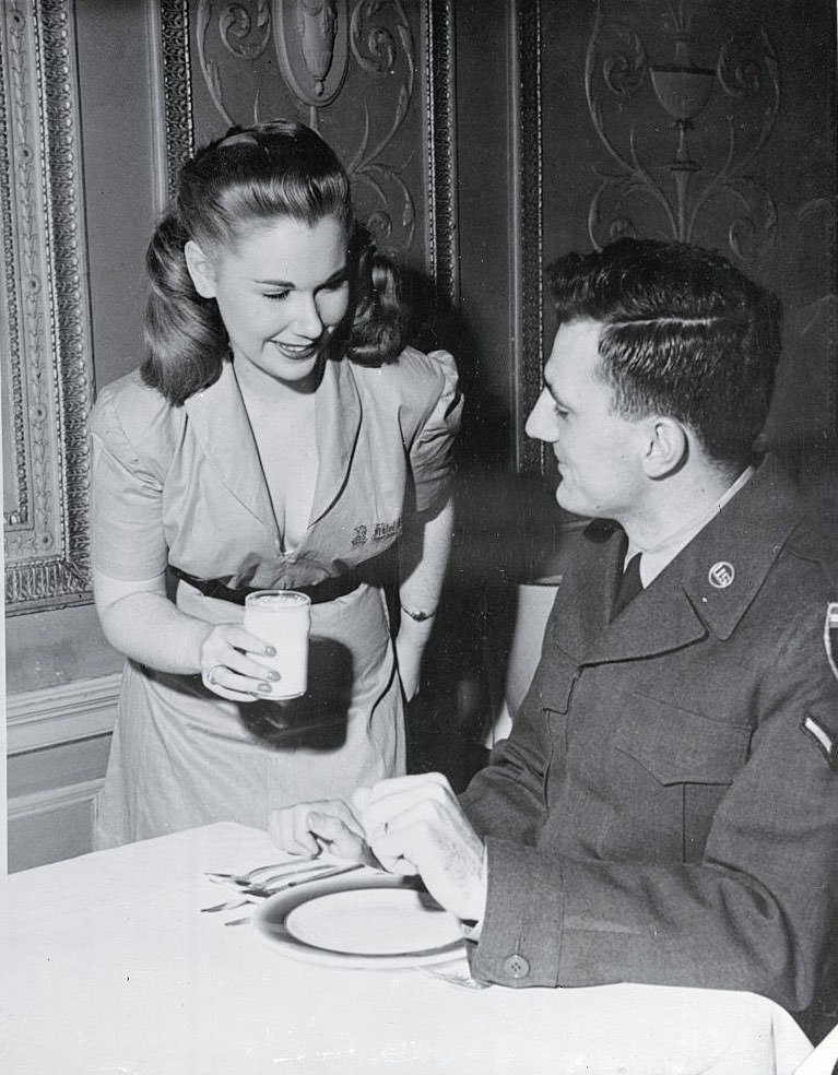 Faye Emerson, performing as waitress, 1949.