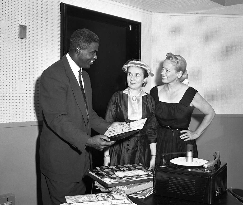 Faye Emerson with Baseball player Jackie Robinson and a contestant, 1953.