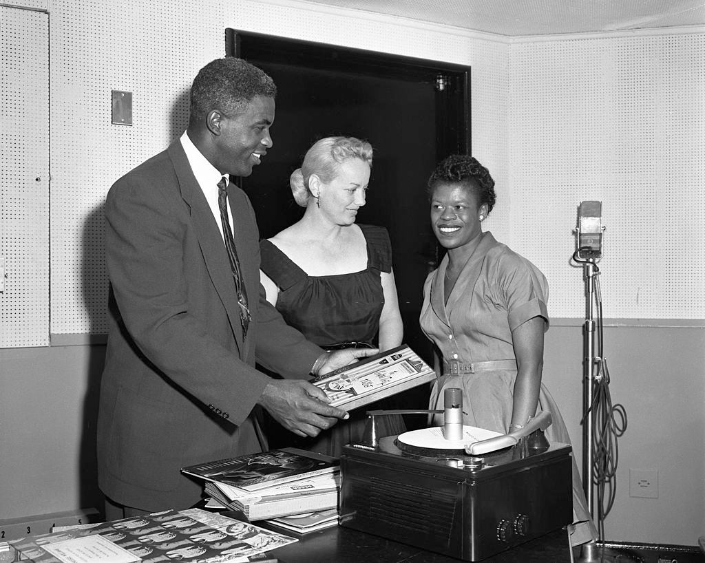 Baseball player Jackie Robinson, host Faye Emerson and a contestant, 1953.