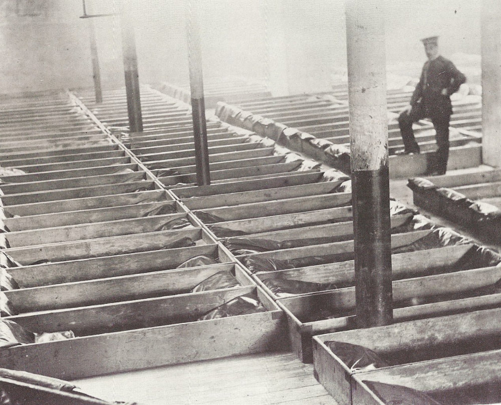 These rows of “coffins” were the men’s sleeping quarters in London’s Burne Street hostel, 1900.