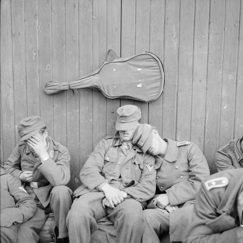 German prisoners of war being processed prior to embarkation from Norway to Germany.