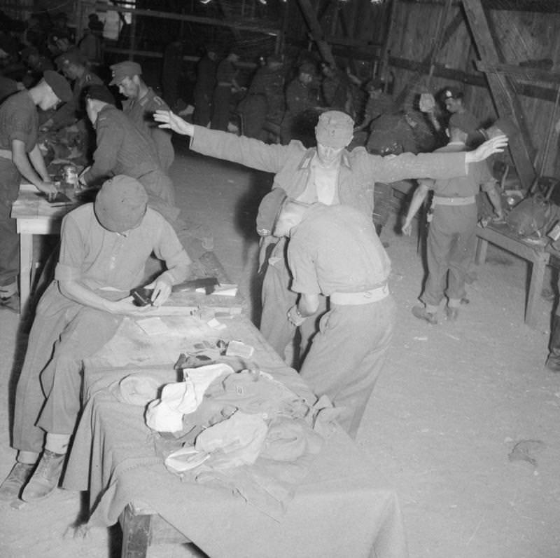 German prisoners of war at Elverum camp being processed prior to embarkation from Norway to Germany.