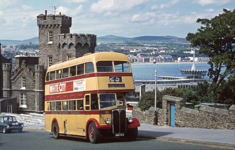 With the bay and Sea Terminal beyond, Douglas Corpn. Regent No.61 (1948) climbs the hill to Douglas Head, 28 June 1971