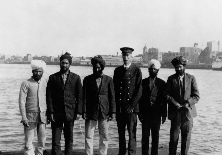 Sikh men meet with a Canadian immigration official during the standoff.