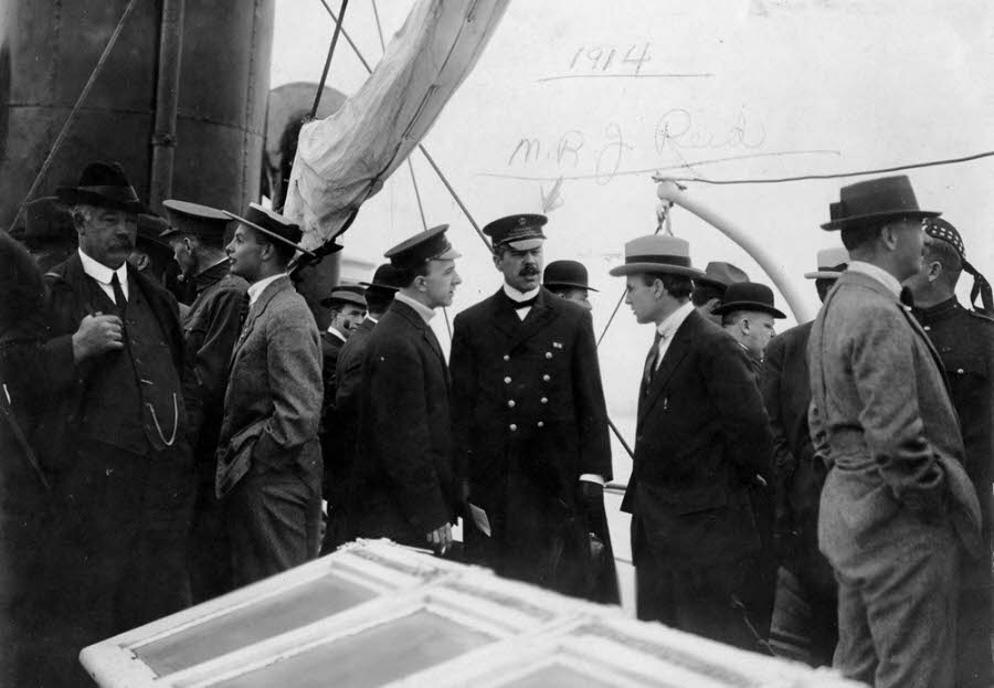 Customs Inspector Malcolm Reid boards the ship with officials and journalists.