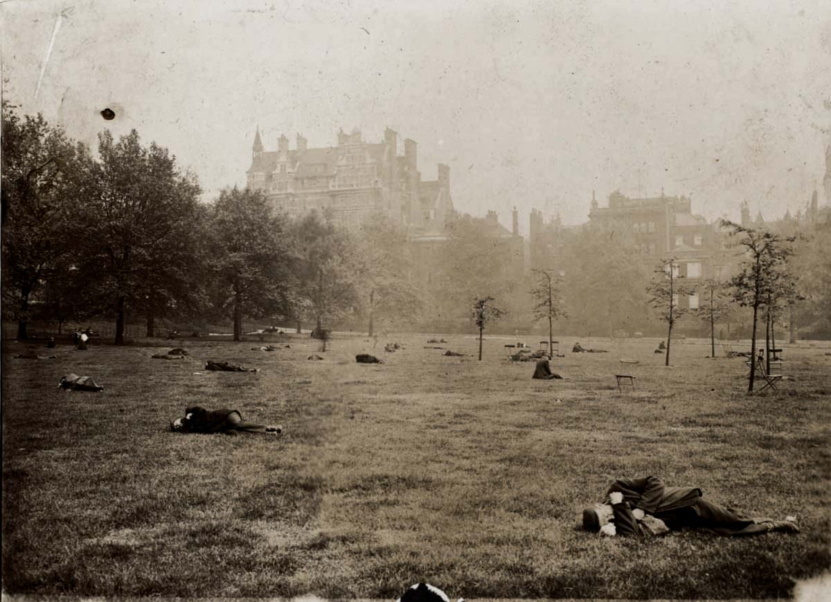 Men sleeping in Green Park.