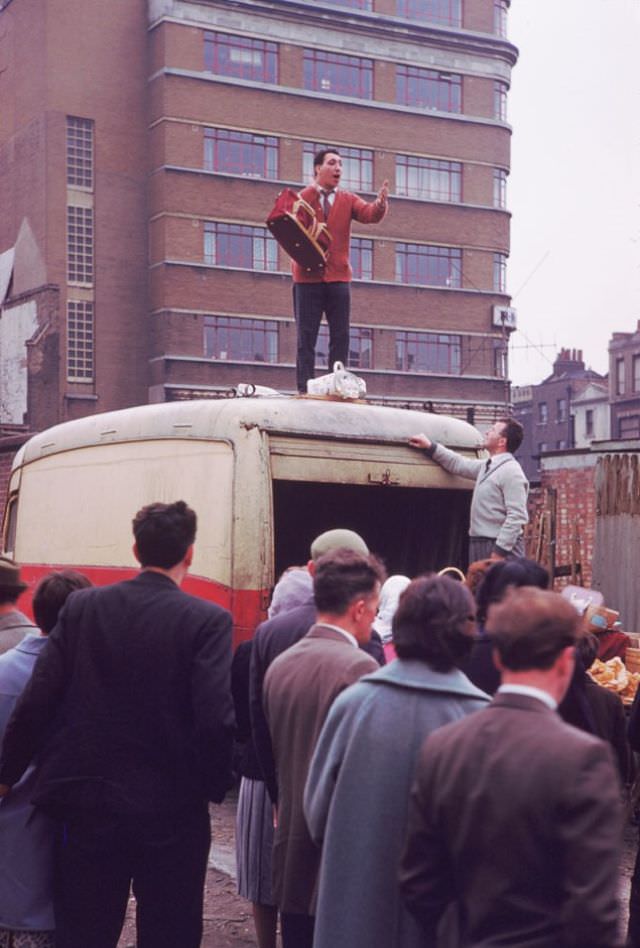 Aldgate Huckster drawing a crowd's attention.