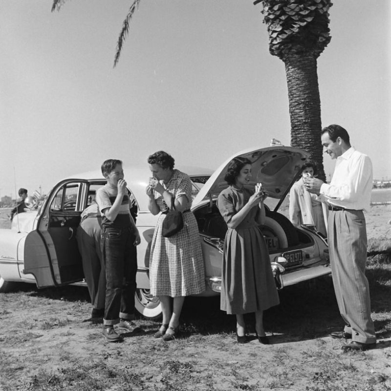 A picnic on the beach, courtesy of Louis Mattar’s tricked-out 1947 Cadillac.