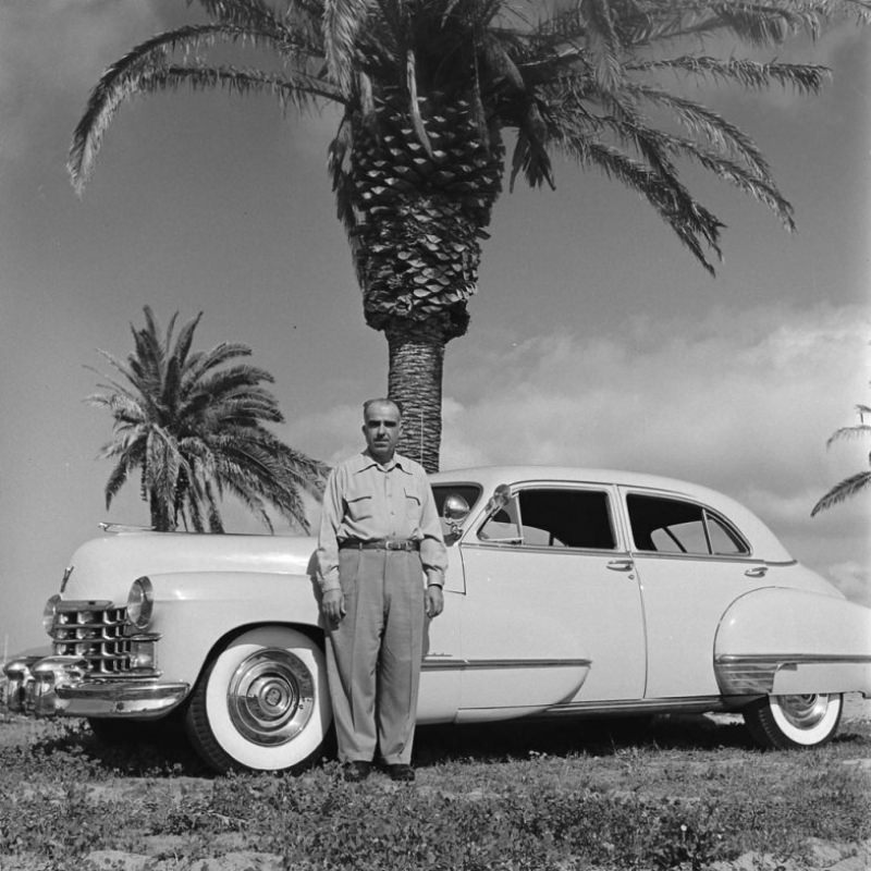 Louis Mattar with his 1947 Cadillac, San Diego, 1952.