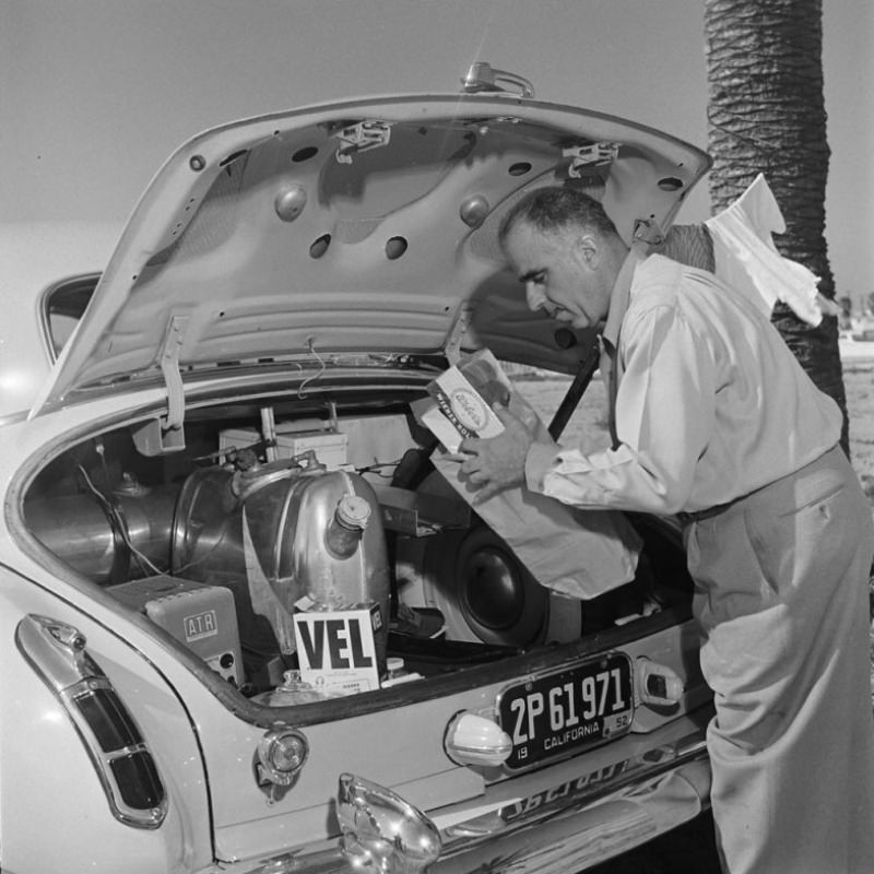 Louis Mattar pulls the makings of a meal from the trunk of his heavily modified 1947 Cadillac.