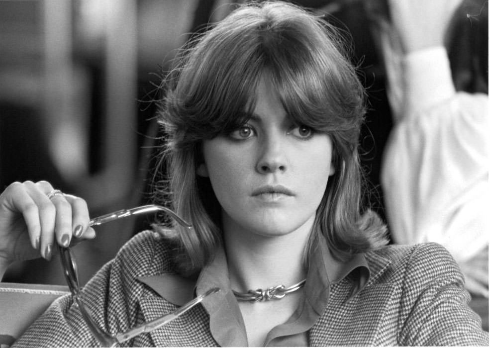 Lynne Frederick holding her glasses in a scene from the film 'Schizo', 1976.