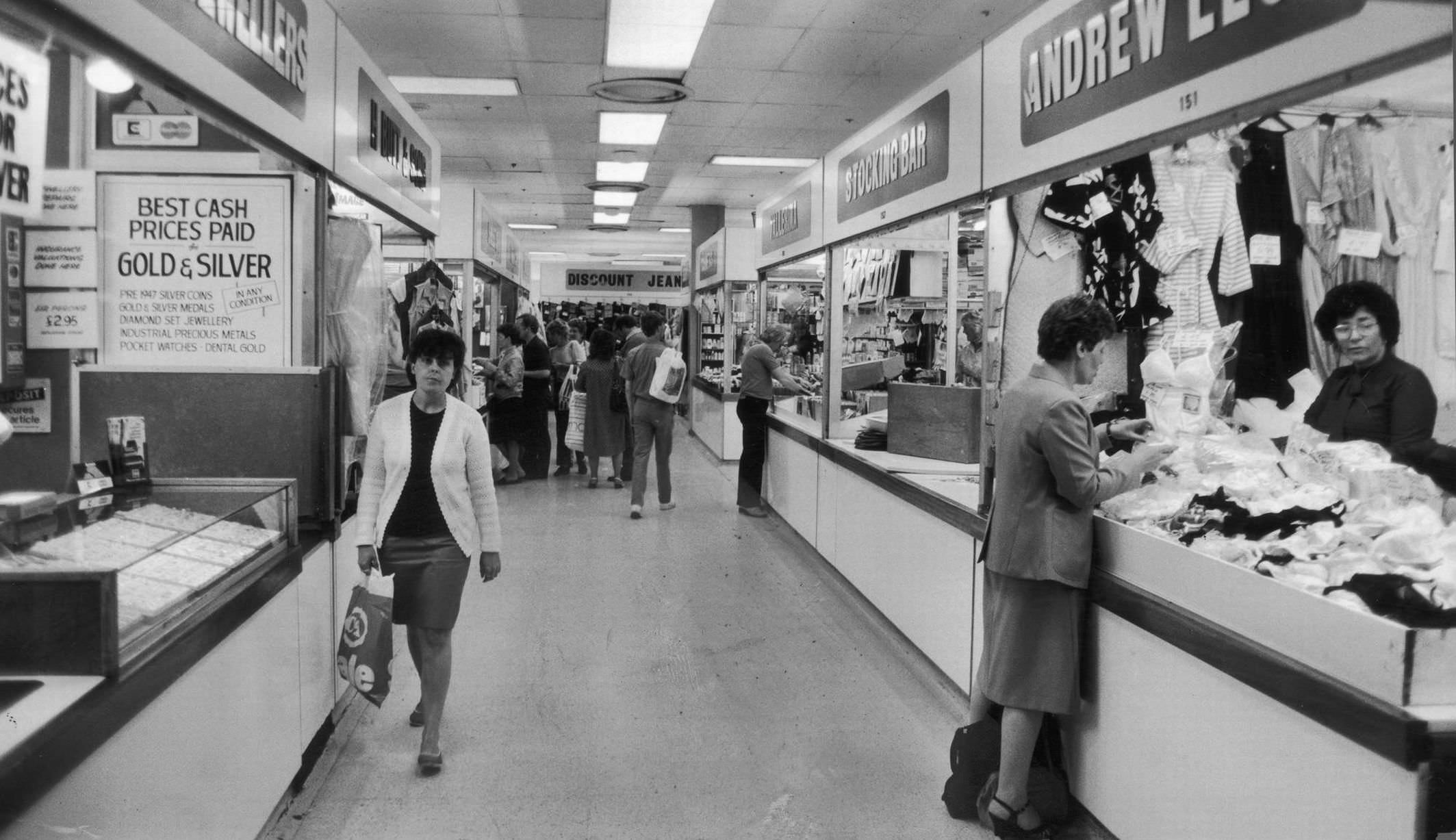 Shoppers browsing in Manchester's High Street Market